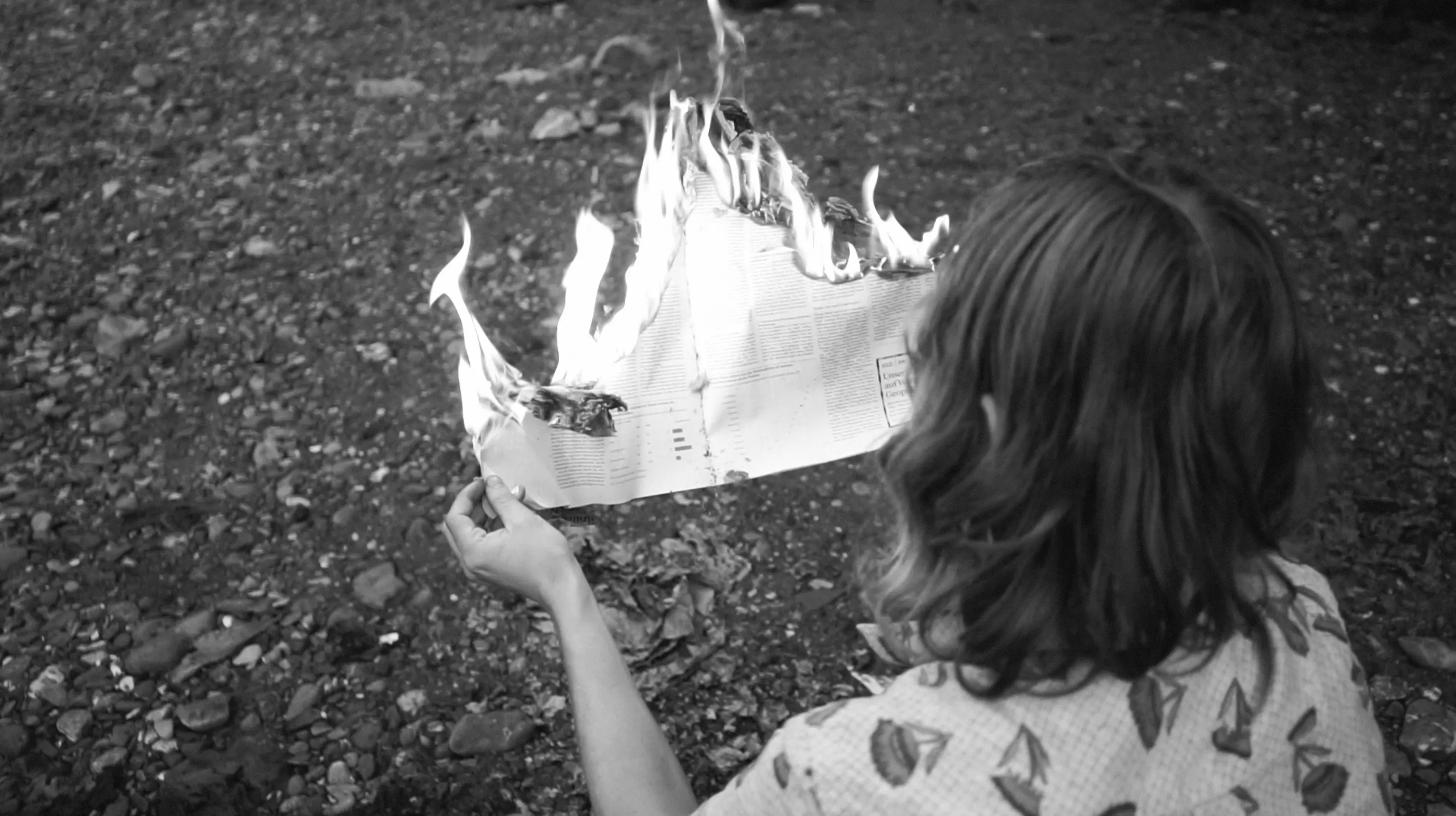 Newspaper in fire